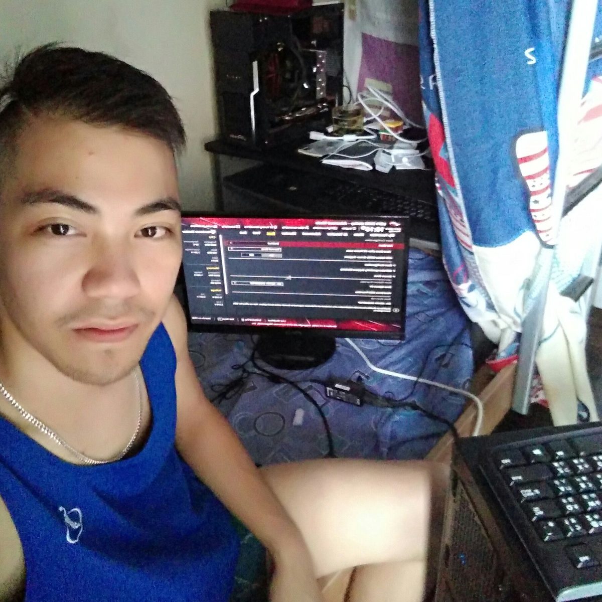Kevin Ordoñez working at a home desk setup with a monitor and keyboard.